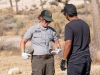 Bernadette Regan, Climbing Ranger, talks with a Climb Smart participant at the Climb Smart service project on Saturday, October 19, 2019 in Joshua Tree National Park, Calif.  The Climb Smart stewardship project, in partnership with the National Park, focuses on lining specific desired paths with rocks to discourage the creation of new use-paths in the heavily impacted area.  (Photo by Suzanne Steiner)