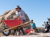 Climbers move hundreds of rocks as part of the Climb Smart service project on Saturday, October 19, 2019 in Joshua Tree National Park, Calif.  The Climb Smart stewardship project, in partnership with the National Park, focuses on lining specific desired paths with rocks to discourage the creation of new use-paths in the heavily impacted area.  (Photo by Suzanne Steiner)